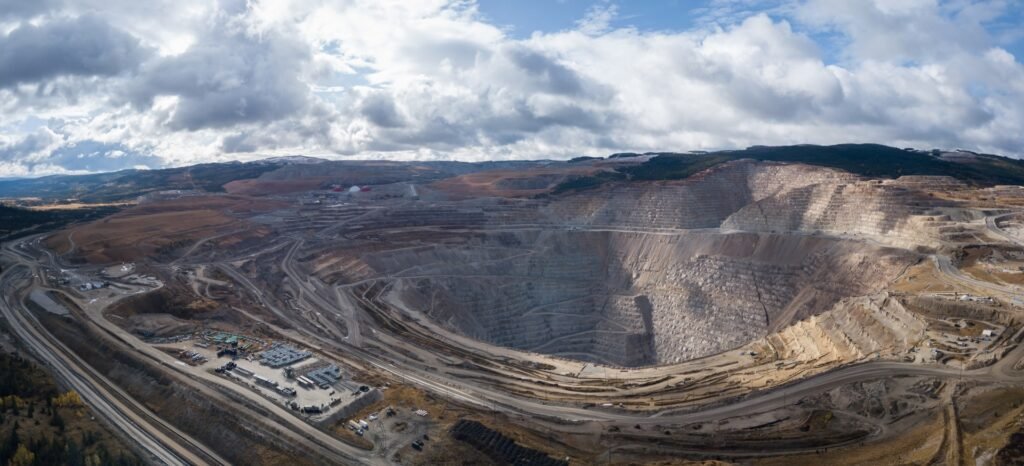 Large open-pit mine illustrating environmental and human rights risks